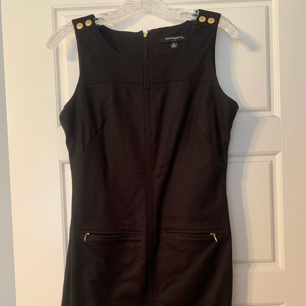 Slim black sheath dress with stretch, pockets